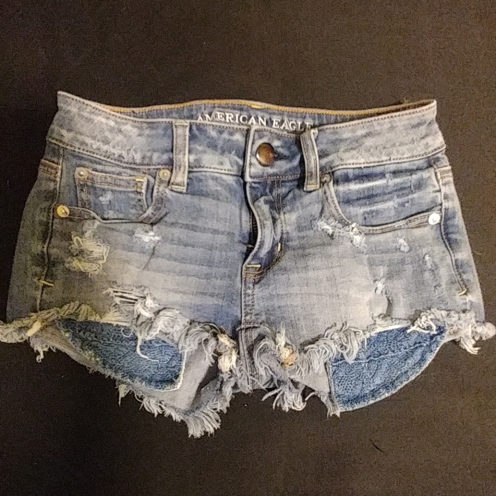 Distressed denim shorts